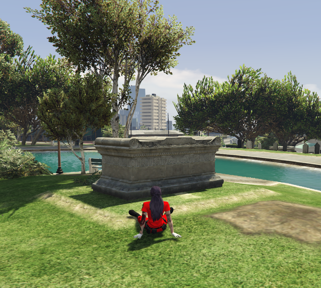 Läheistä muistelemassa haudalla